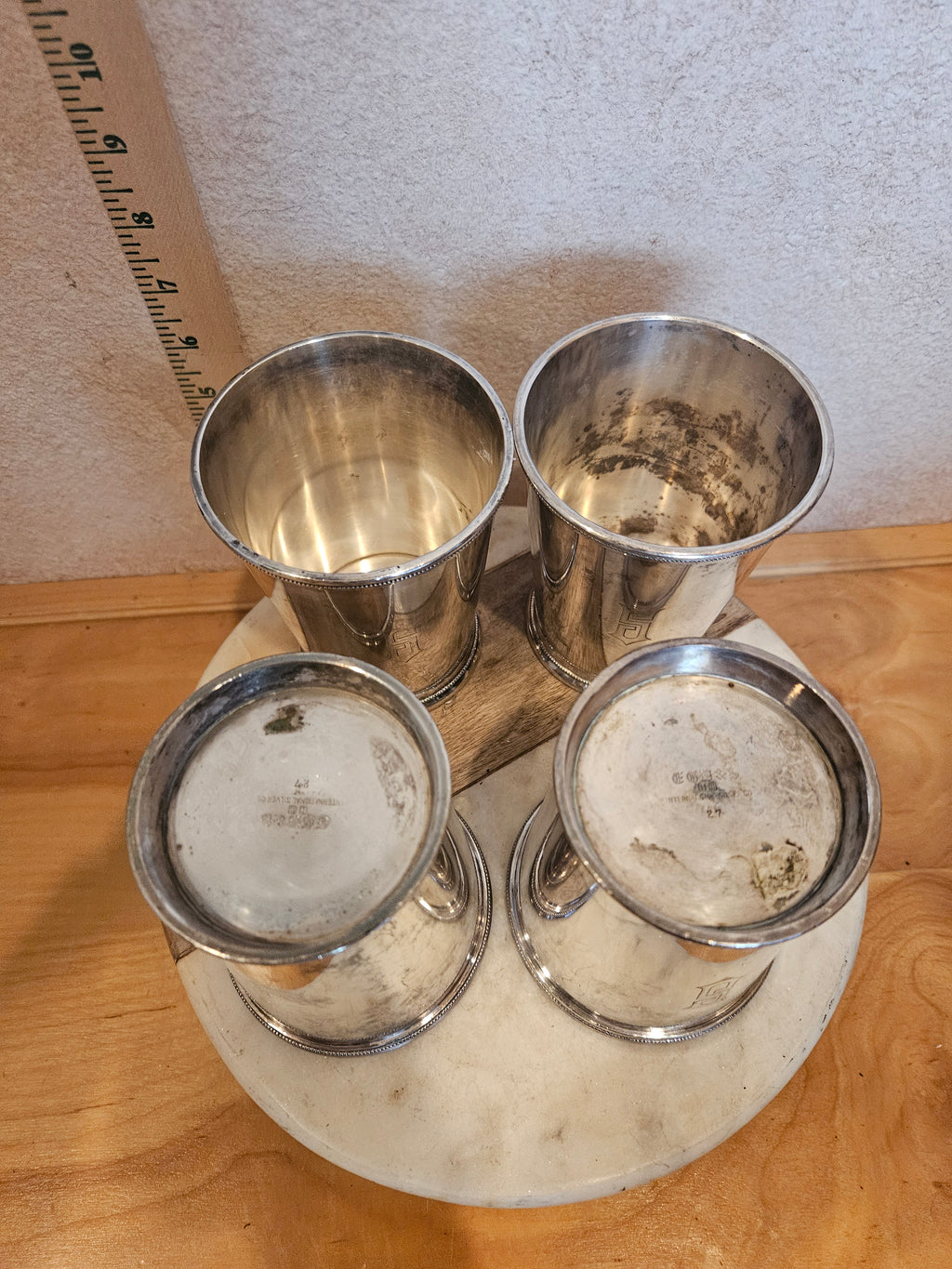 Set of 4 Silver Plated Cups on Marble Base