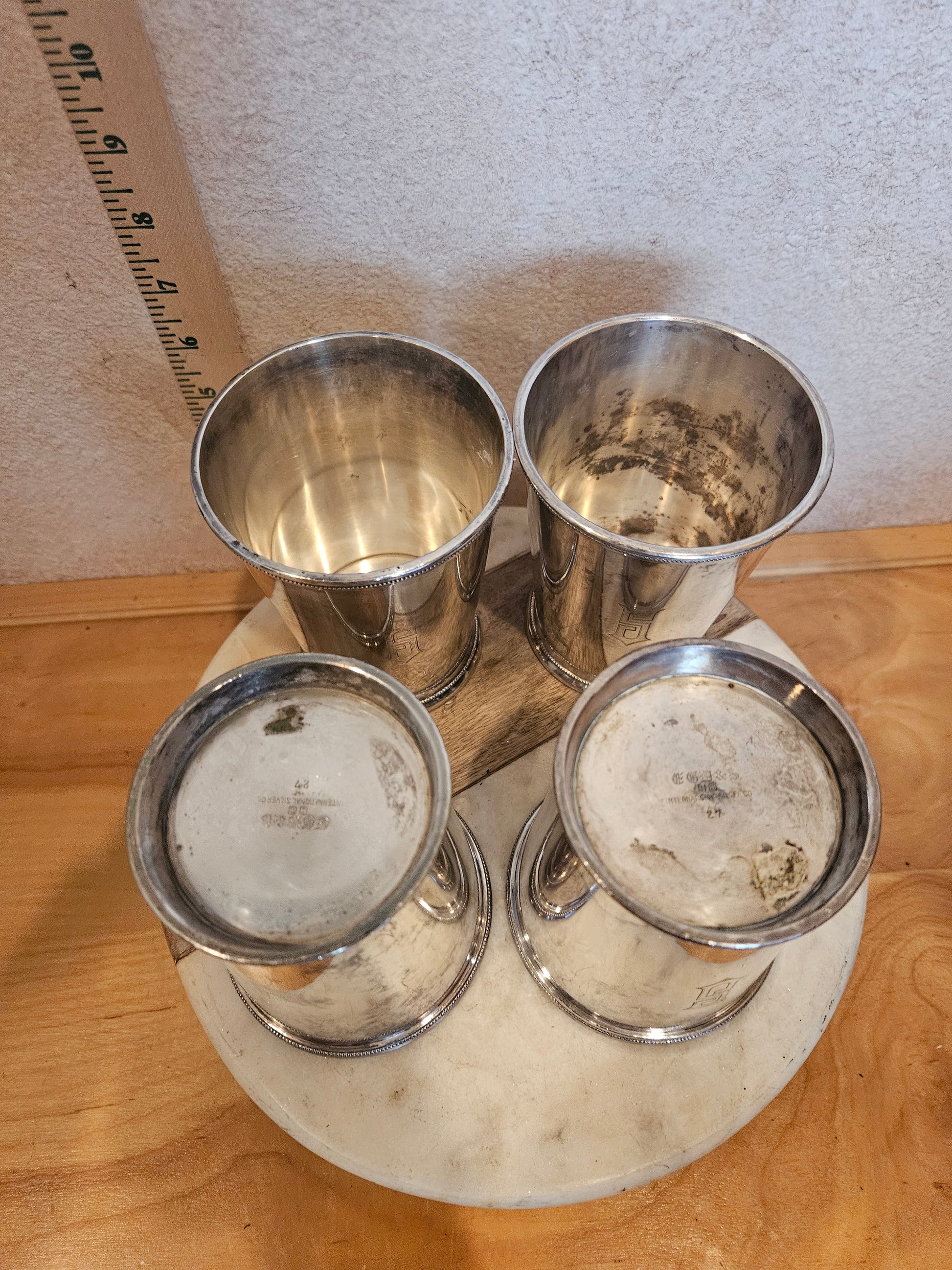 Set of 4 Silver Plated Cups on Marble Base