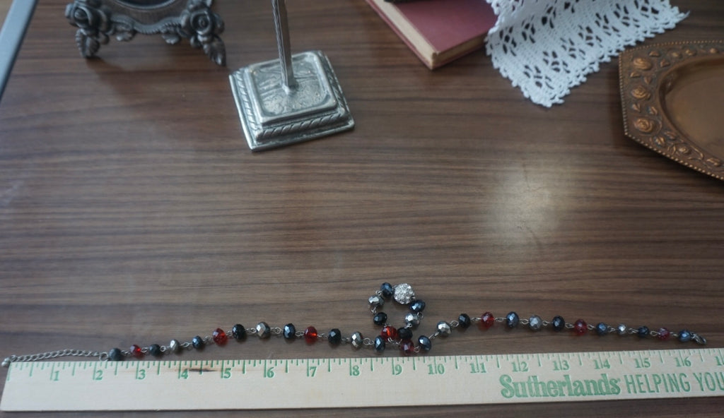 Beaded Necklace with Red, Black, and Silver Accents