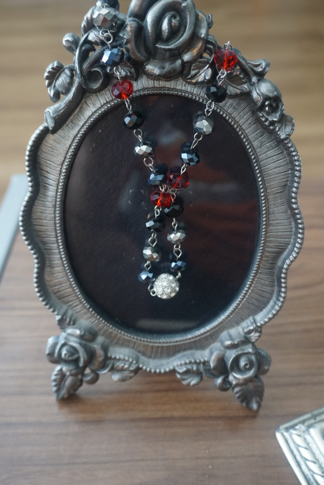 Beaded Necklace with Red, Black, and Silver Accents