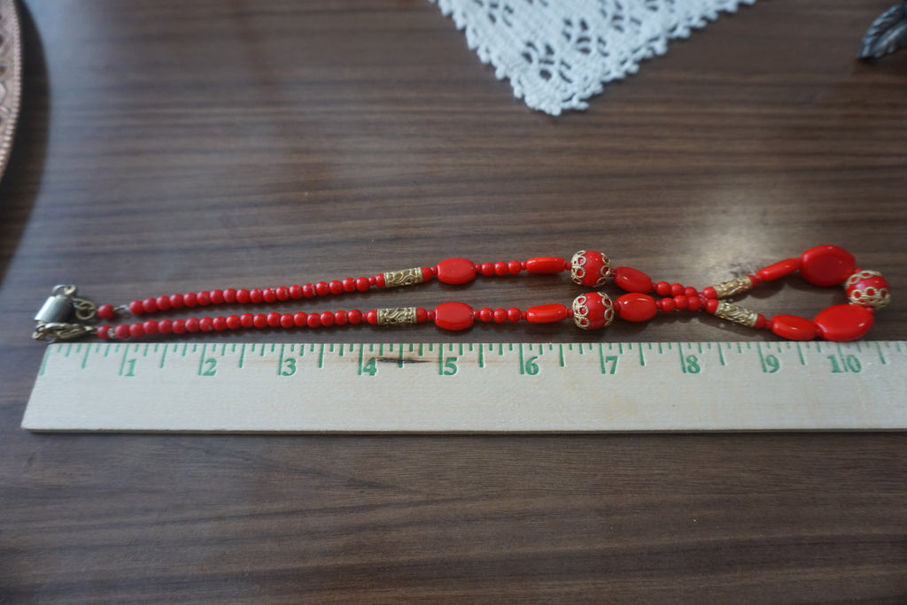 Elegant Red Beaded Necklace with Gold Accents