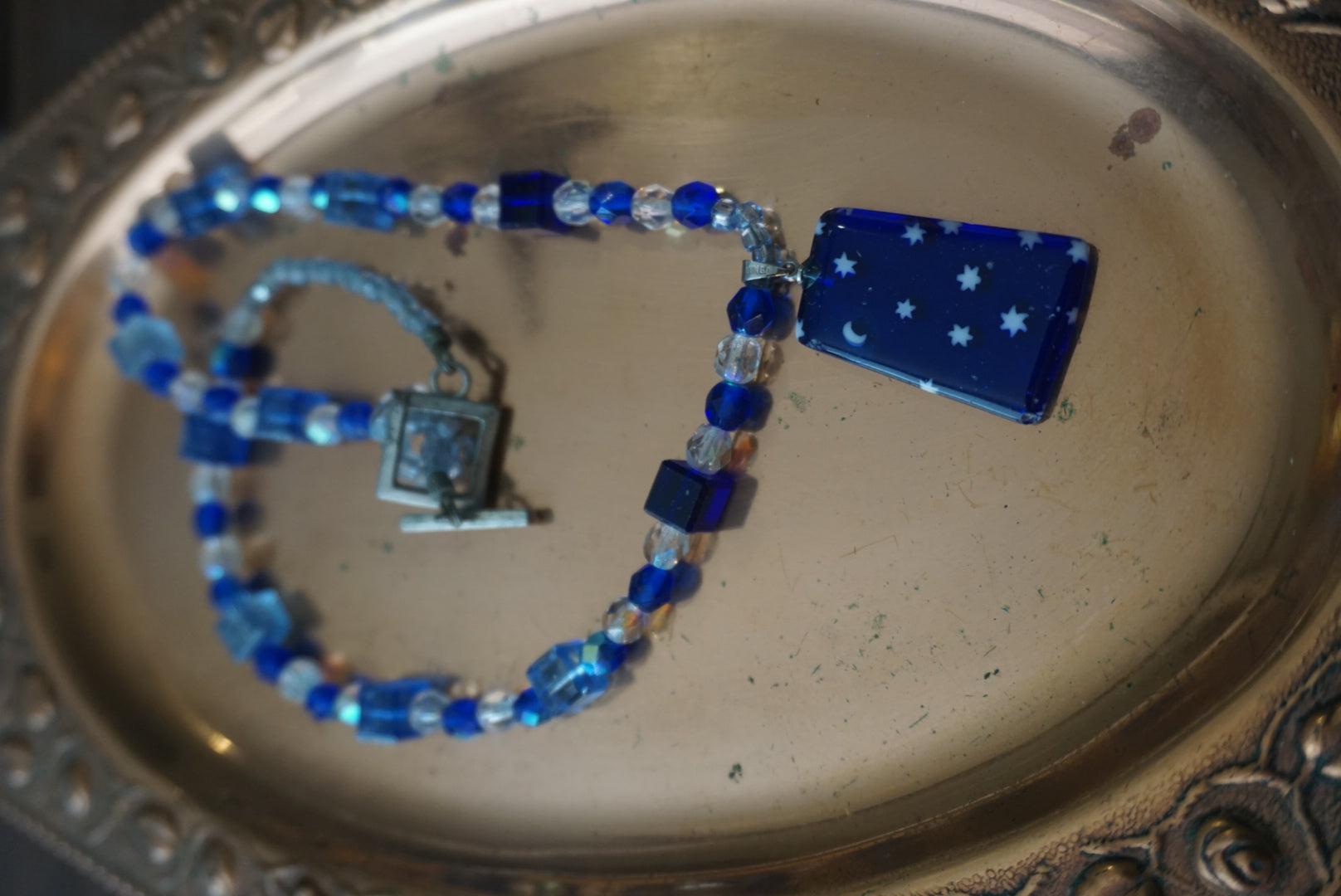 Blue Beaded Necklace with Star and Moon Pendant
