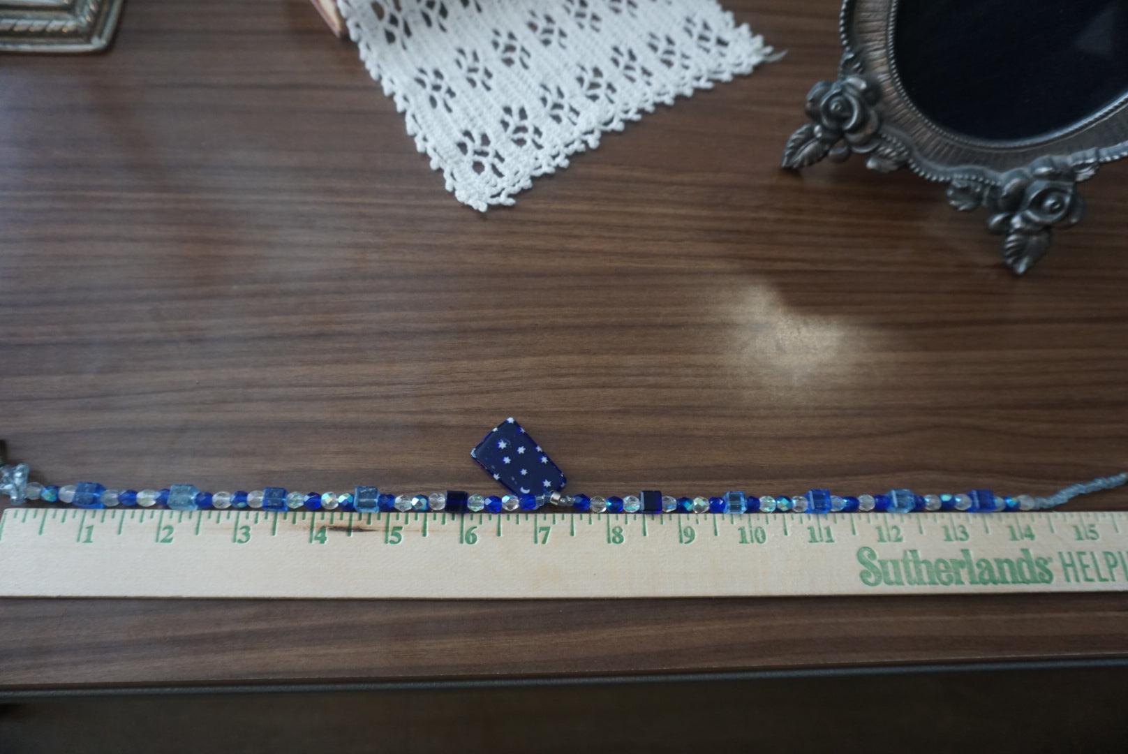 Blue Beaded Necklace with Star and Moon Pendant