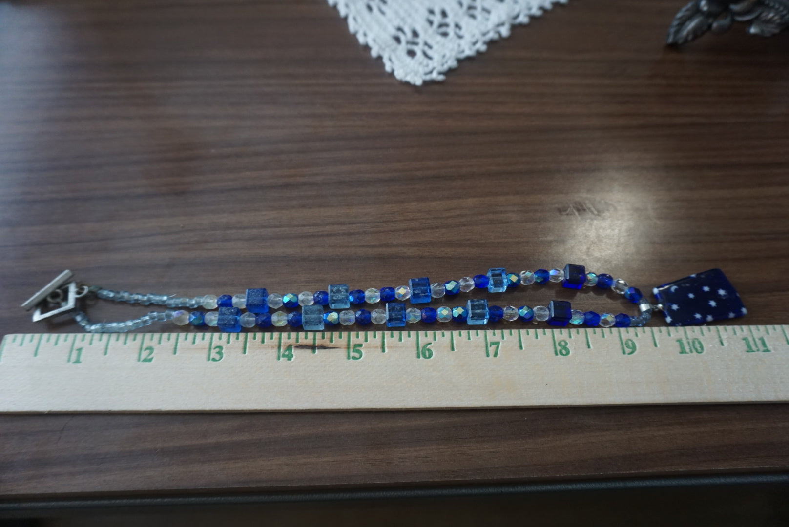 Blue Beaded Necklace with Star and Moon Pendant