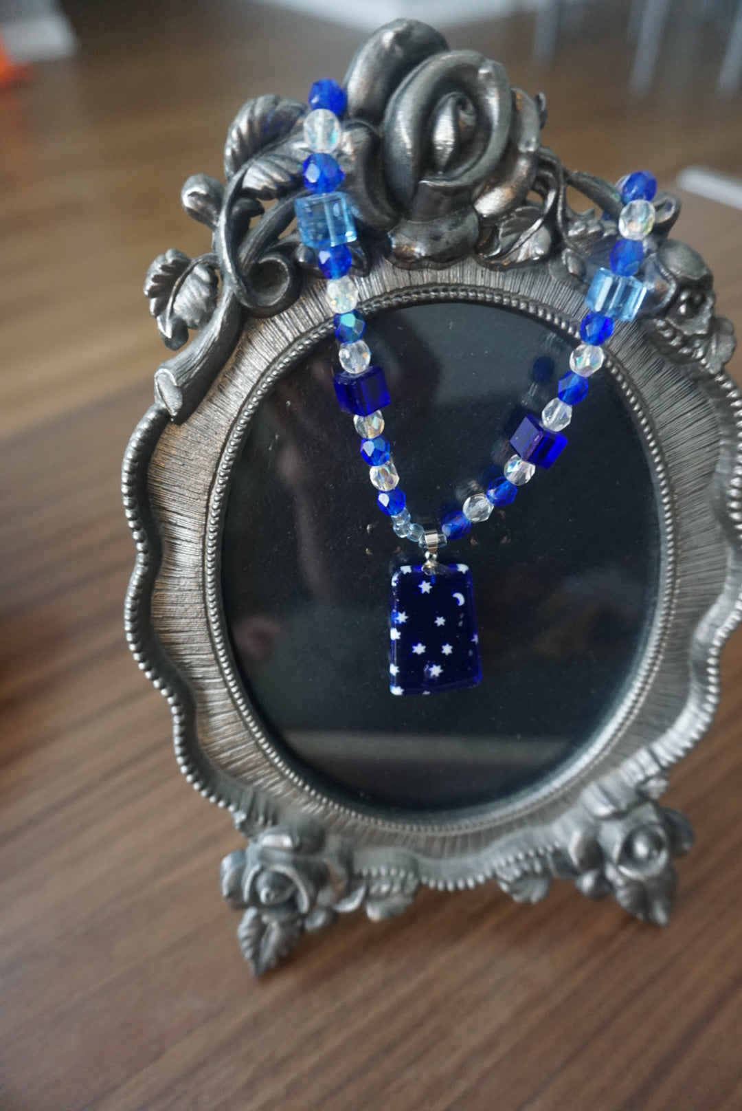 Blue Beaded Necklace with Star and Moon Pendant
