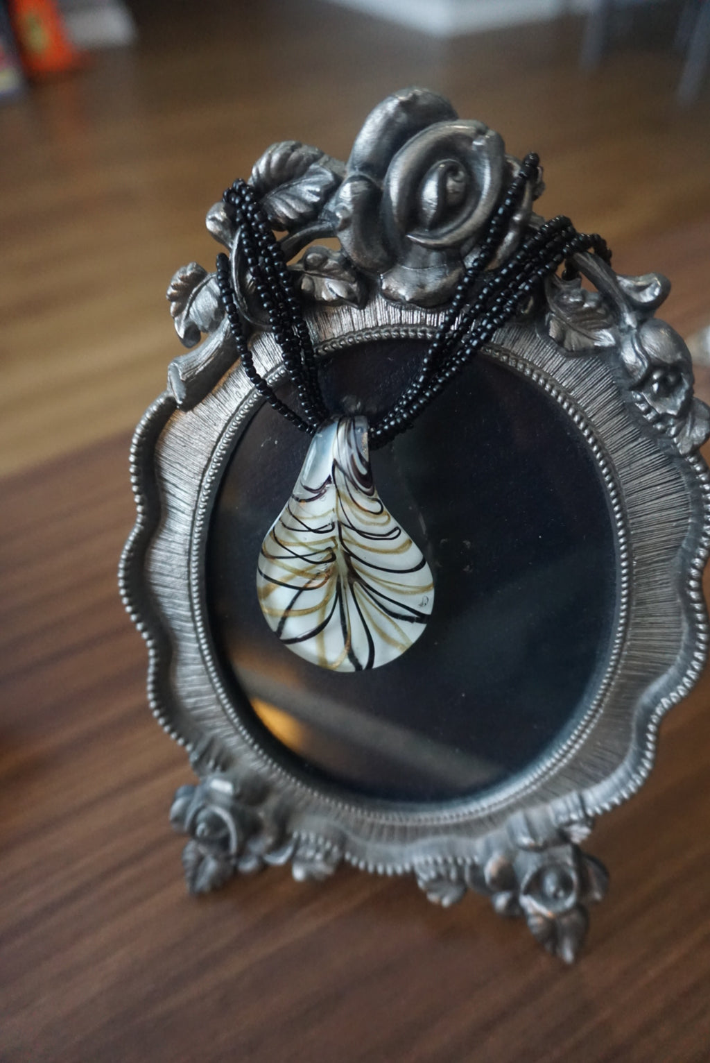 Black Beaded Necklace with Teardrop Pendant