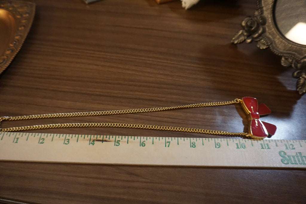 Gold Chain Necklace with Red Bow Pendant