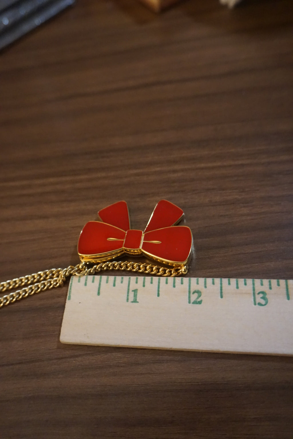 Gold Chain Necklace with Red Bow Pendant