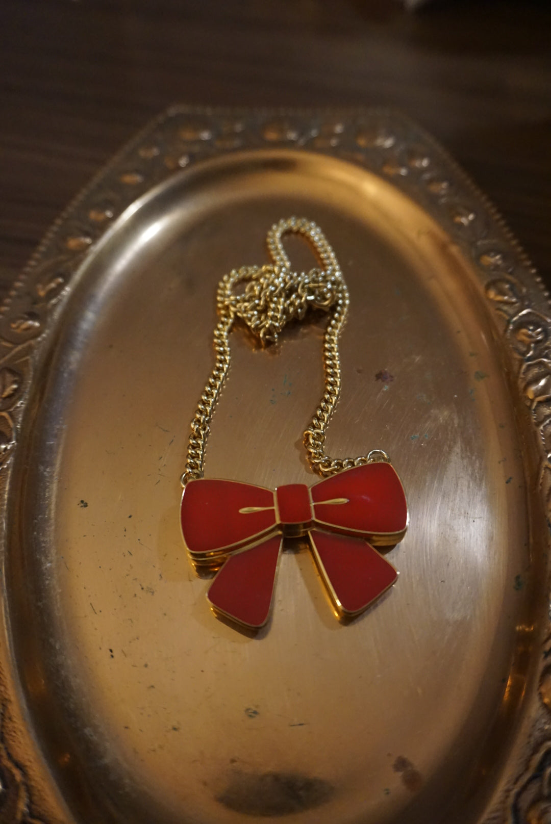 Gold Chain Necklace with Red Bow Pendant