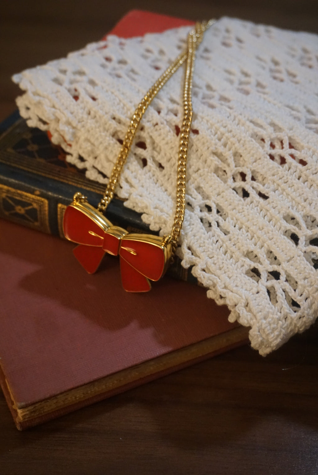 Gold Chain Necklace with Red Bow Pendant