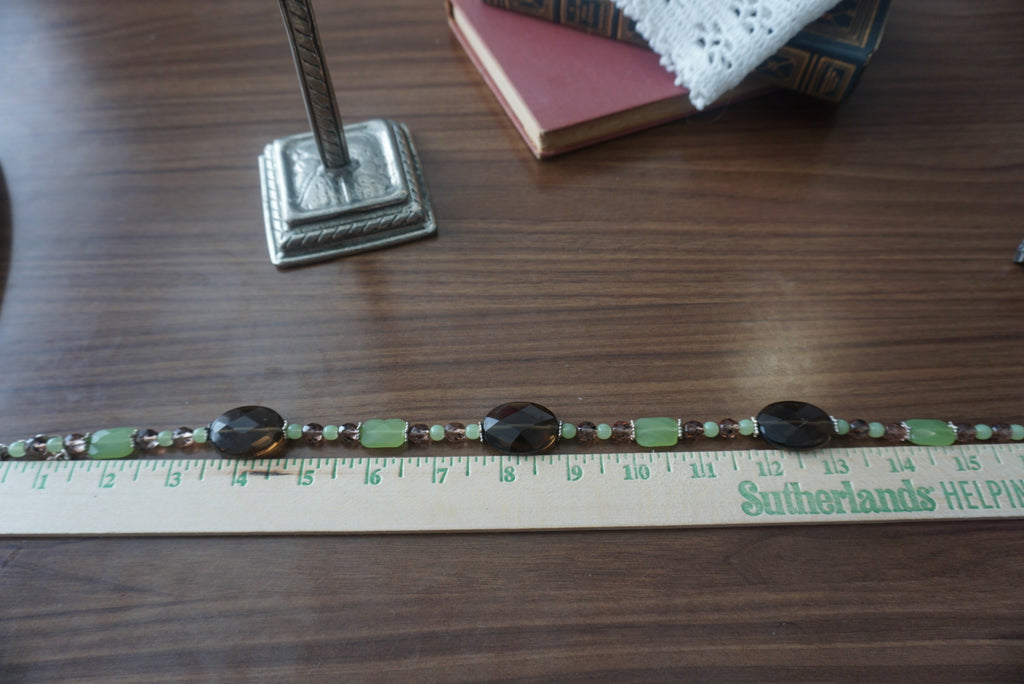 Elegant Beaded Necklace with Green and Brown Accents