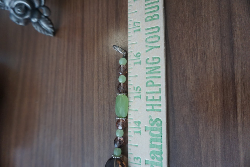 Elegant Beaded Necklace with Green and Brown Accents