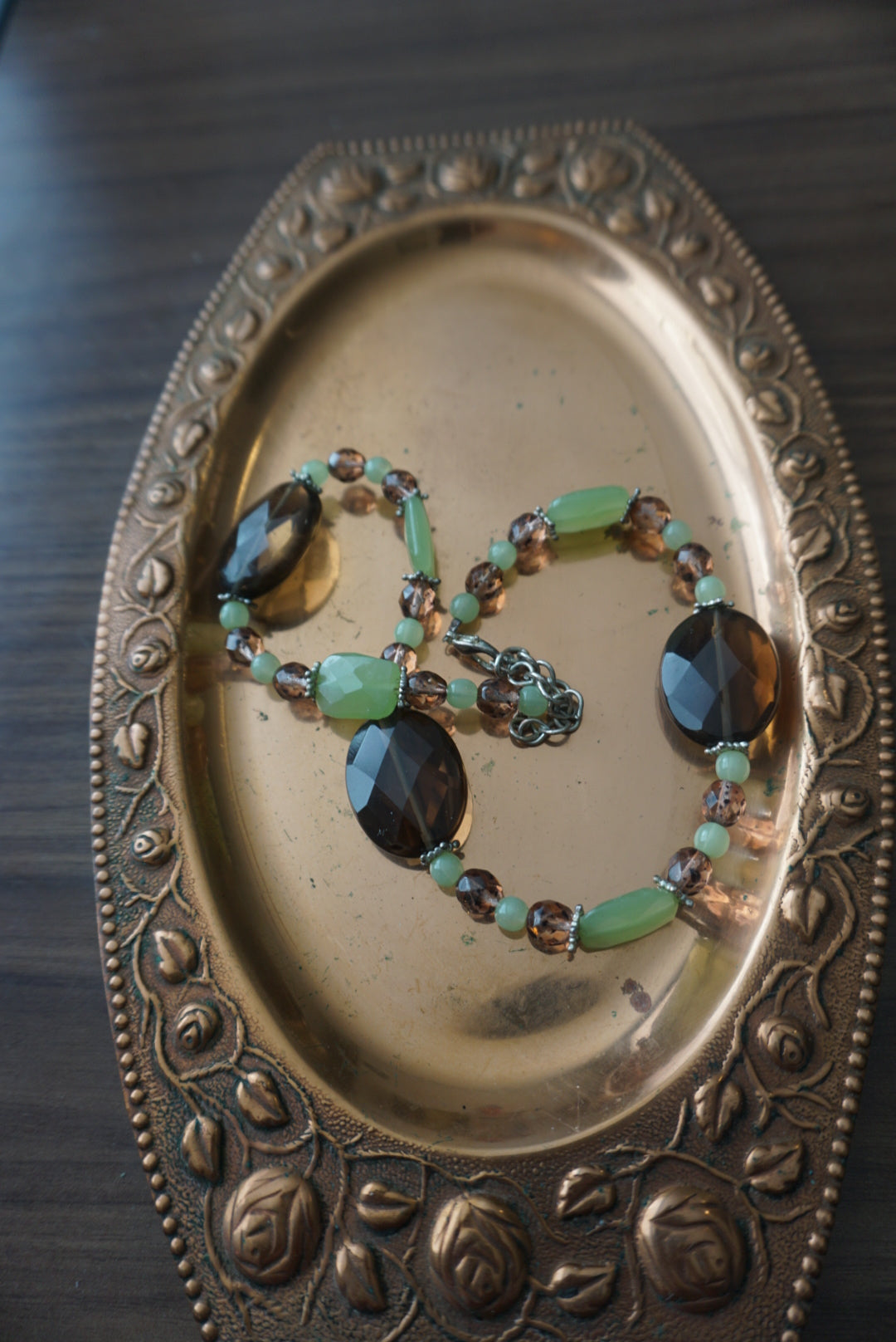 Elegant Beaded Necklace with Green and Brown Accents