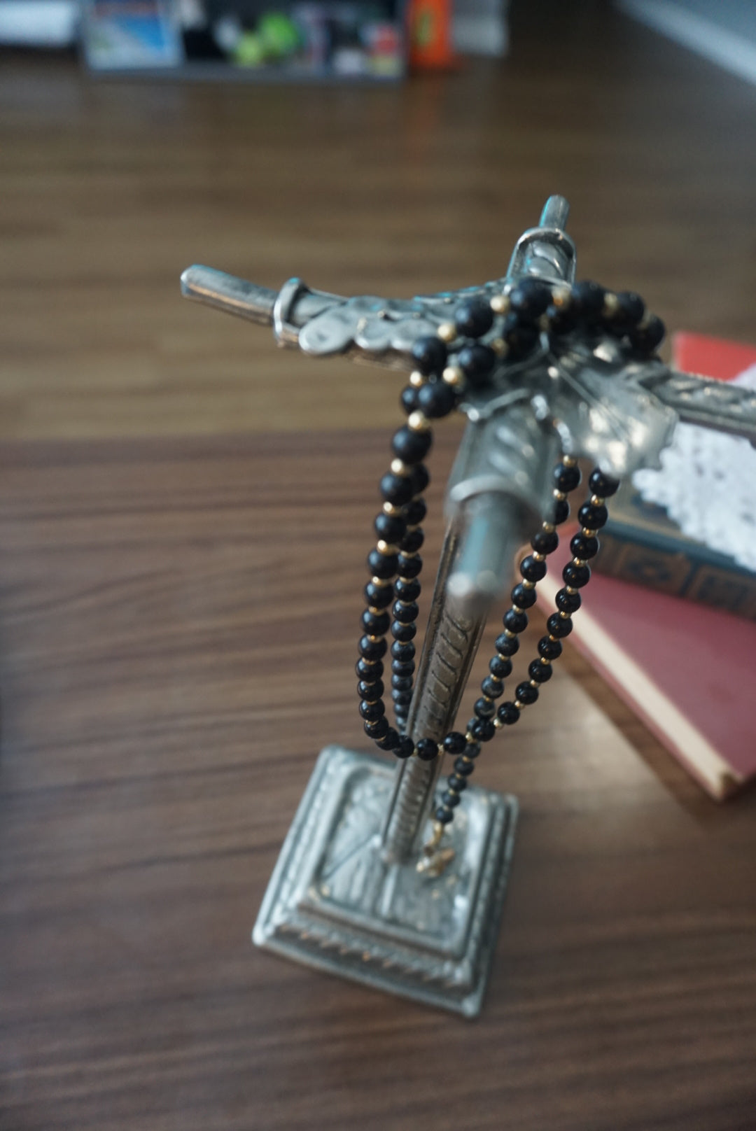 Black Beaded Necklace with Gold Accents