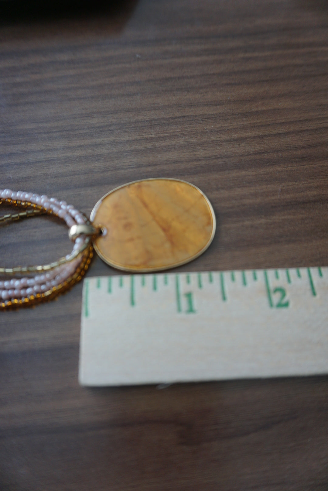 Multi-Strand Gold and Beige Pendant Necklace