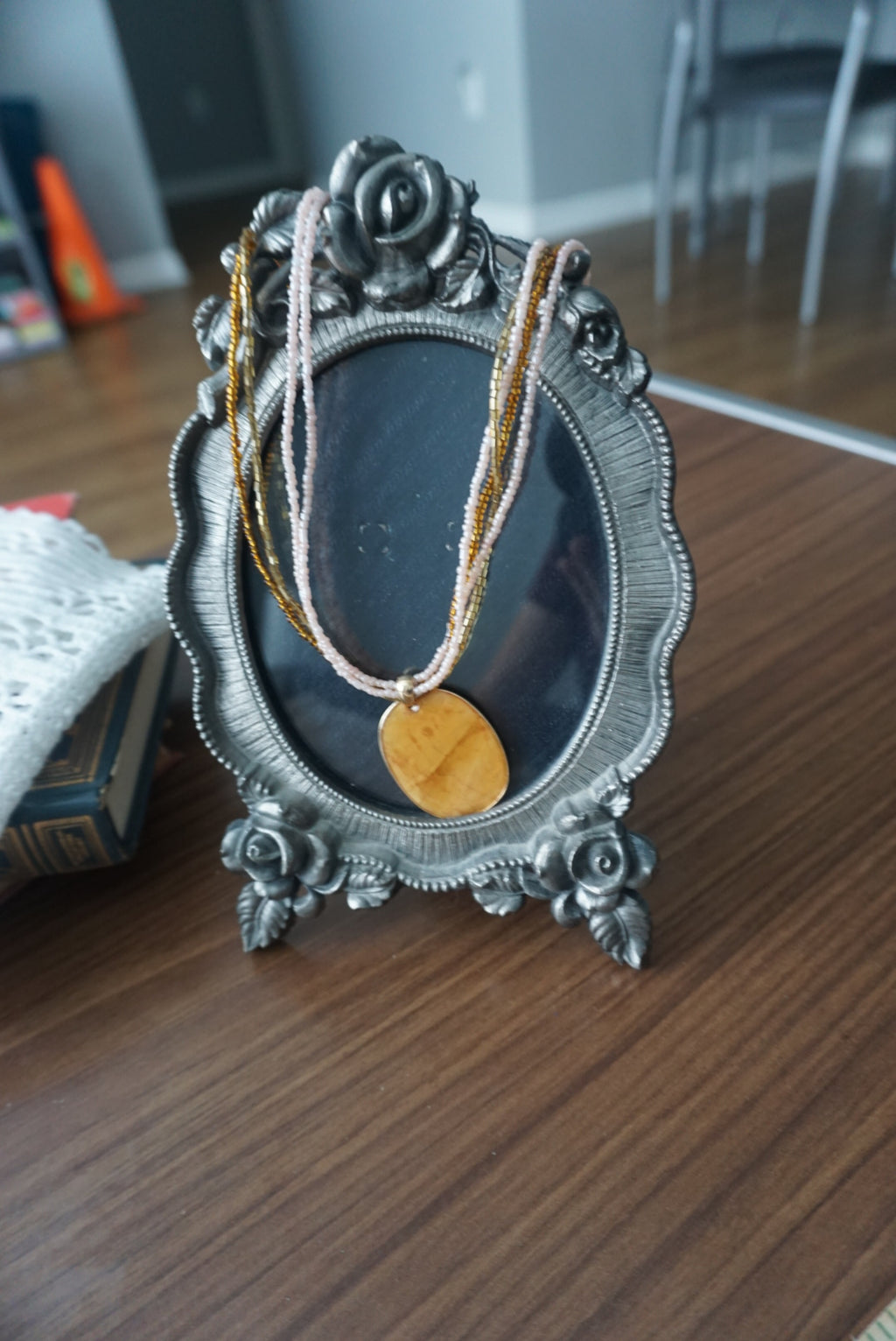 Multi-Strand Gold and Beige Pendant Necklace