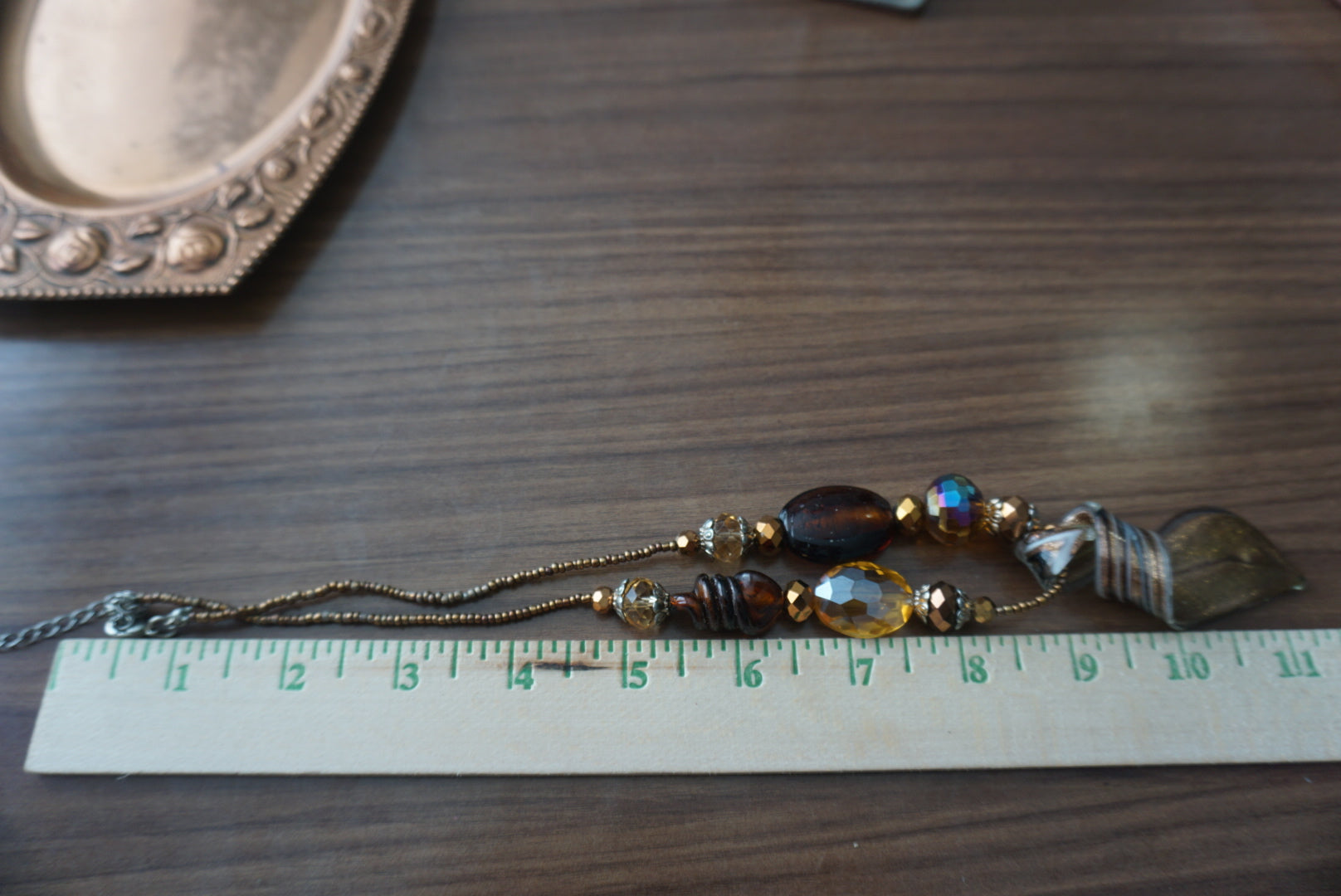 Elegant Gold-Tone Beaded Necklace with Pendant