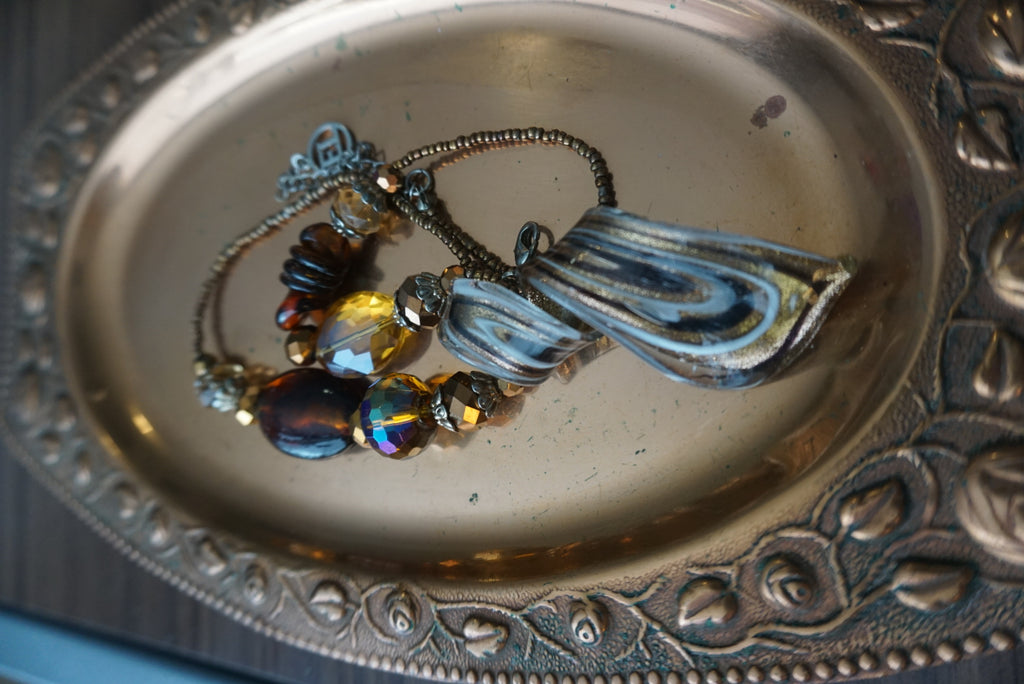 Elegant Gold-Tone Beaded Necklace with Pendant