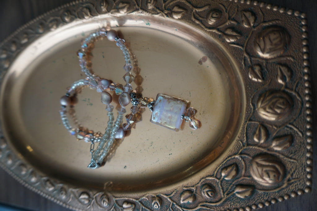 Elegant Beaded Necklace with Gold Pendant