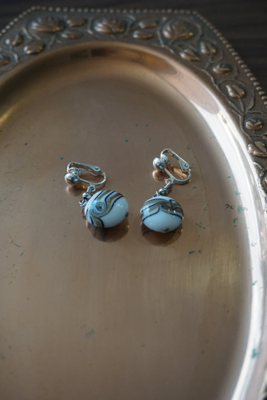 Elegant White and Gold Swirl Earrings