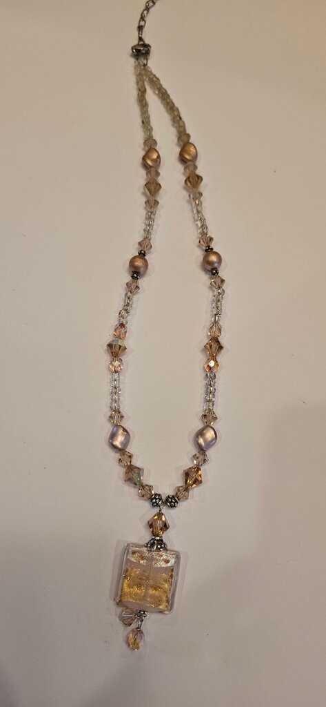 Elegant Beaded Necklace with Gold Pendant