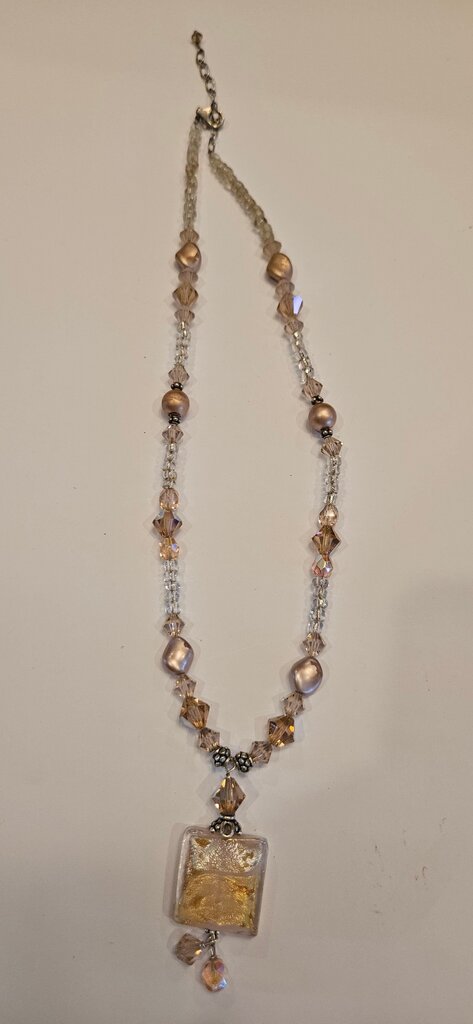 Elegant Beaded Necklace with Gold Pendant