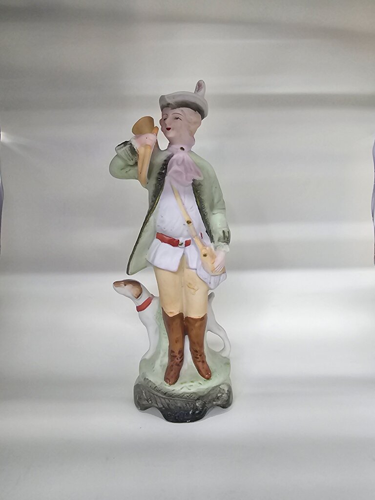 Vintage Figurine of Boy with Dog lable