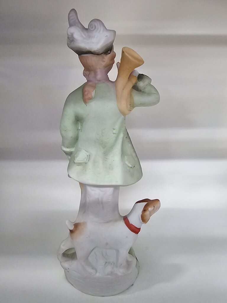Vintage Figurine of Boy with Dog lable