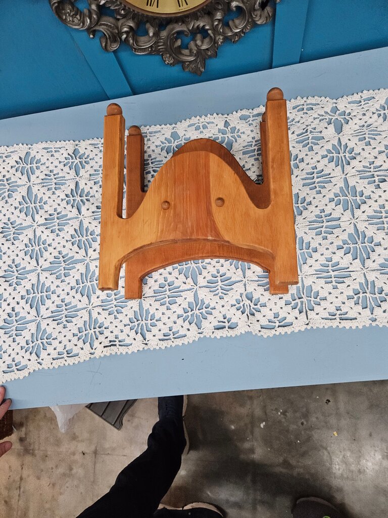 A charming wooden decorative stand perfect for displaying items or as a unique home accent. Crafted with a classic design, ideal for enhancing your interior decor.