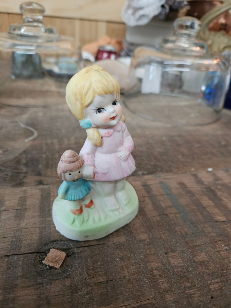 Vintage Ceramic Girl Figurine with Doll
