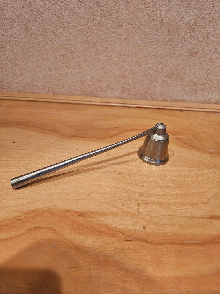 beautiful chrome colored candle snuffer