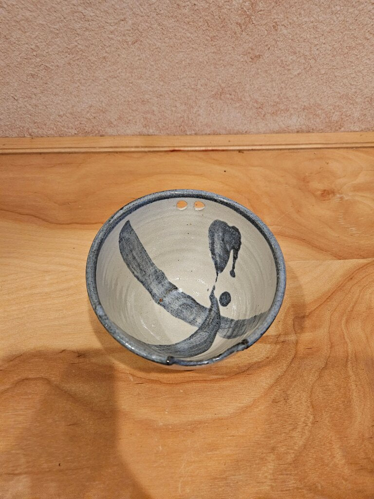 Handcrafted Ceramic Bowl with Unique Design