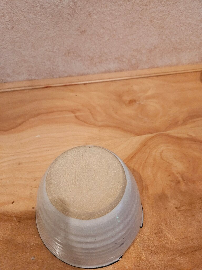 Handcrafted Ceramic Bowl with Unique Design