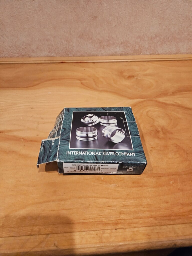 International Silverplated *Napkin Holders* in box set of 4 rings