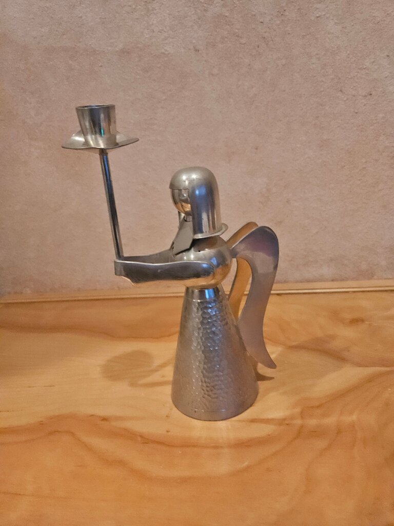 Vintage Metal Figure Holding Hat