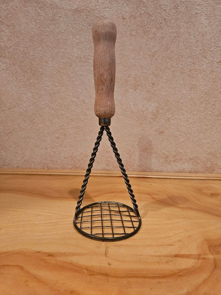 Vintage Potato Masher with twisted handles