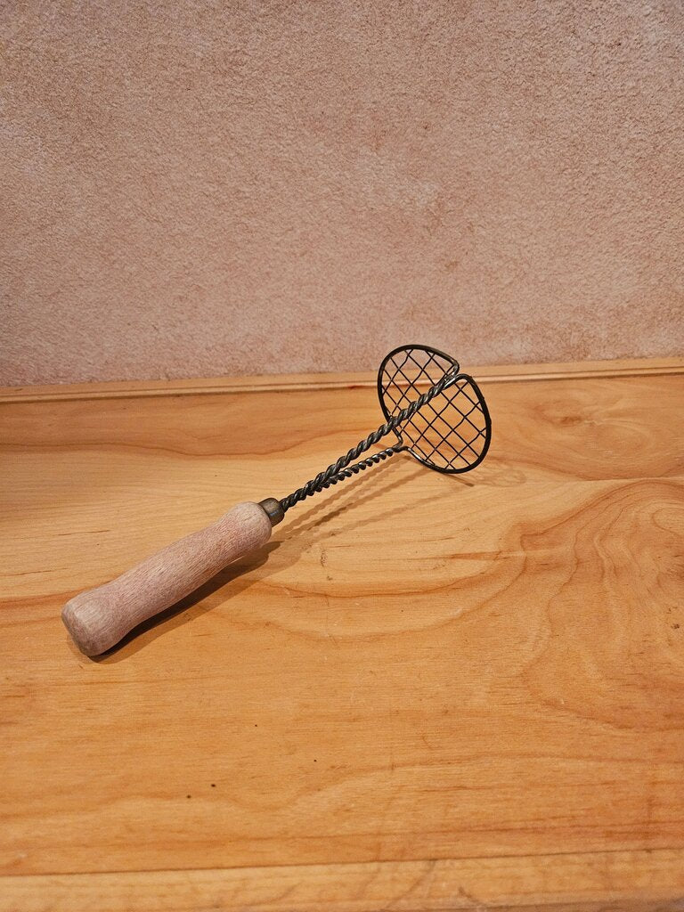 Vintage Potato Masher with twisted handles