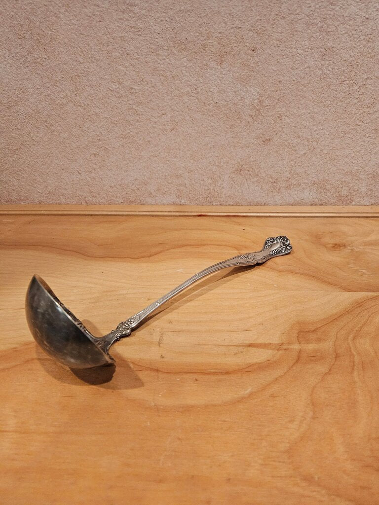 Vintage Silver Ladle with Ornate Handle