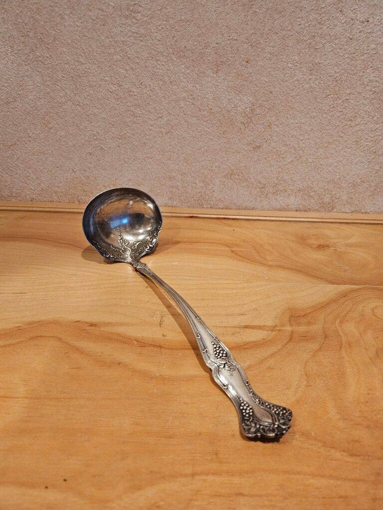 Vintage Silver Ladle with Ornate Handle
