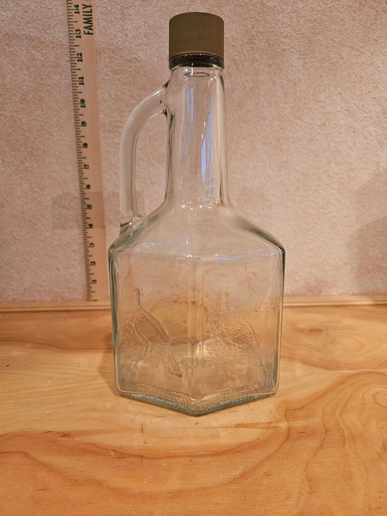 Old Liquor Bottle with Turkeys on sides with Handle and cap