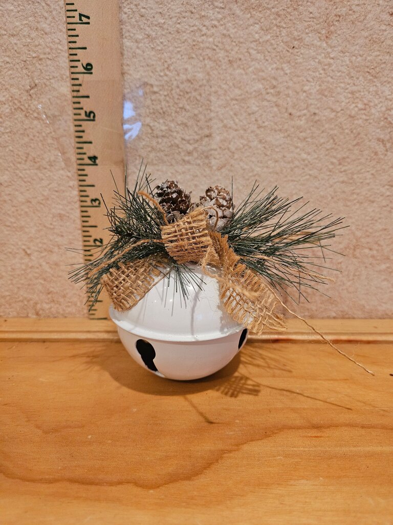 Decorative White Bell with Pinecones and Burlap