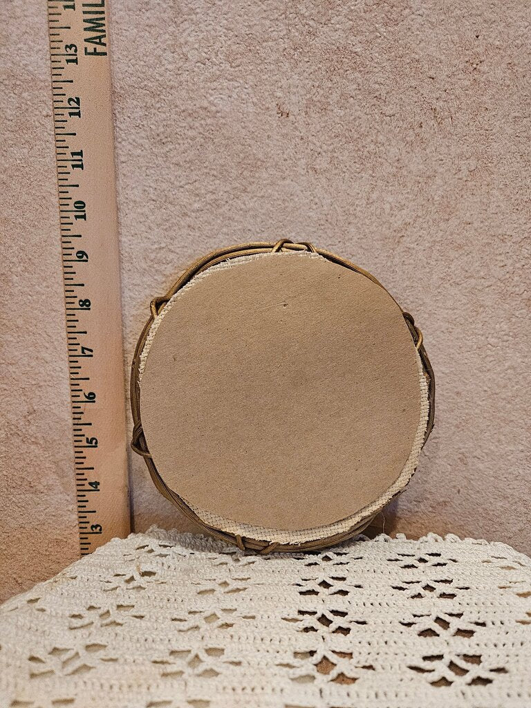 Vintage Finished Cross Stitch / Crewel Featuring folk art couple, in a grapevine circle-shaped wreath frame