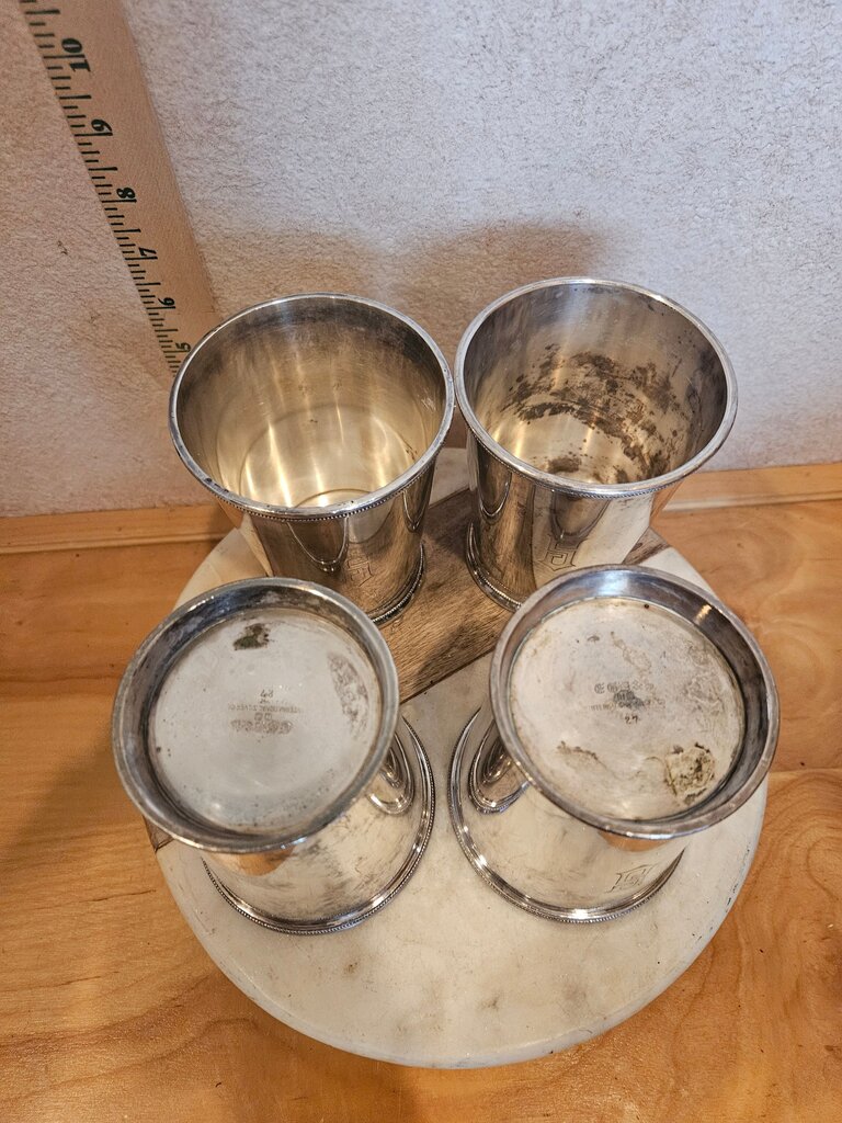Set of 4 Silver Plated Cups on Marble Base