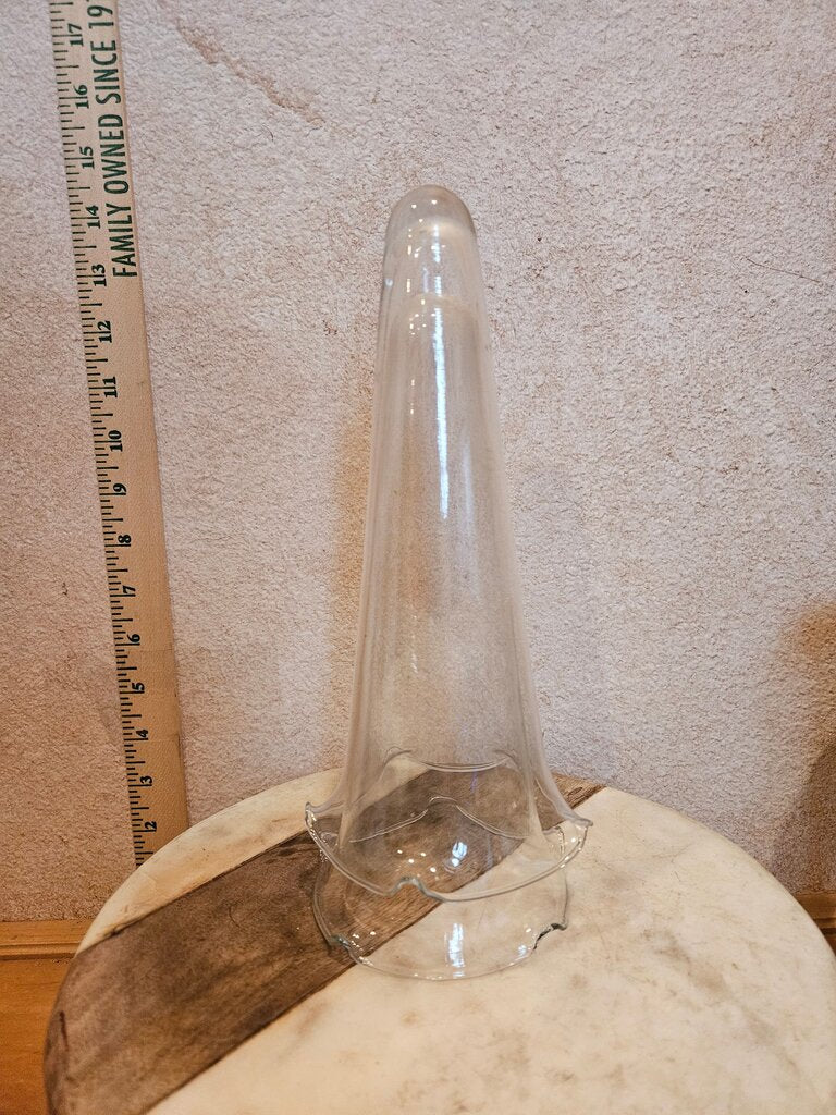 Set of two clear glass cone weights designed for stabilizing flower arrangements. Ideal for home decoration or event styling.