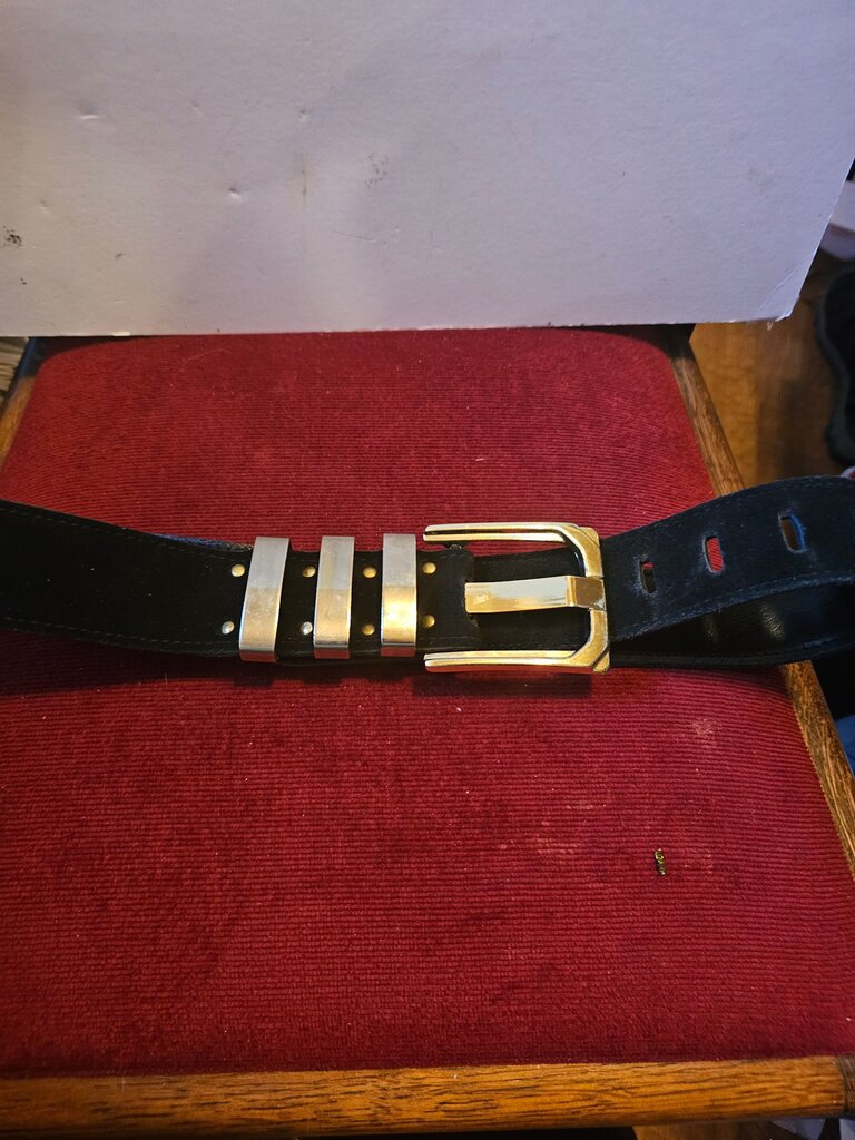 Stylish Black Leather Belt with Metallic Accents