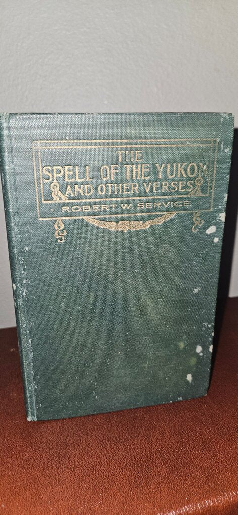 The Spell of the Yukon and Other Verses by Robert W. Service