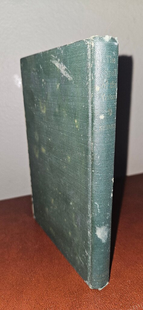 The Spell of the Yukon and Other Verses by Robert W. Service