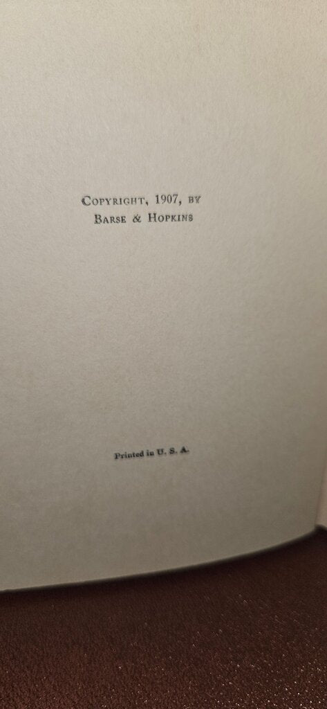 The Spell of the Yukon and Other Verses by Robert W. Service