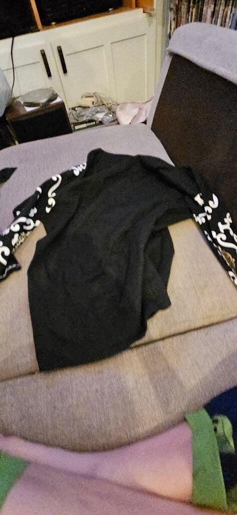 Black Long Sleeve Shirt with White and Gold Design