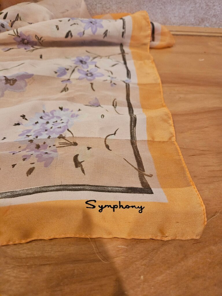 Symphony Scarfs Silk Floral Scarf Orange Trim Floral Silk Chiffon Scarf Gray, Orange, & Purple Square Scarf light pulling visible